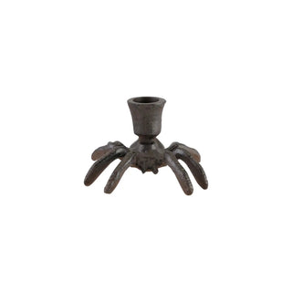 Cast iron spider-shaped taper candle holder in dark finish