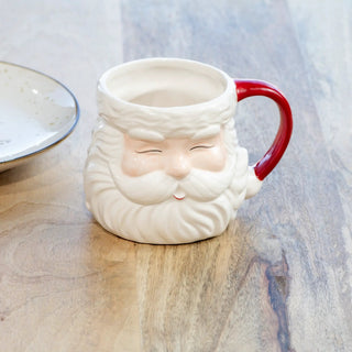 Santa head mug ceramic with red handle and white glaze