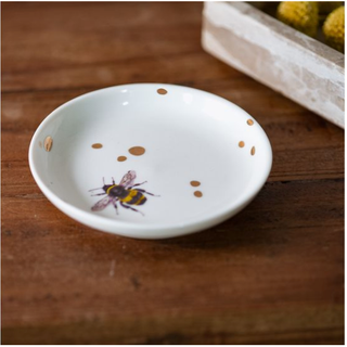 Honeybee Dot Dish, white ceramic dish with a bee illustration and scattered brown dots.