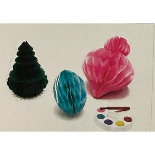 Christmas cracker Little Nutcracker set with honeycomb tree, blue egg, pink rosette shapes and paint palette.
