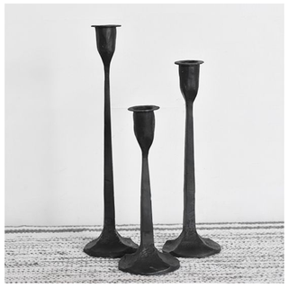 Iron candle holders, black, set of three with varying heights.