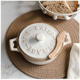 Latte-colored ceramic Brie Baker with lid, 9.25 inches, embossed BRIE-BAKER on the lid.