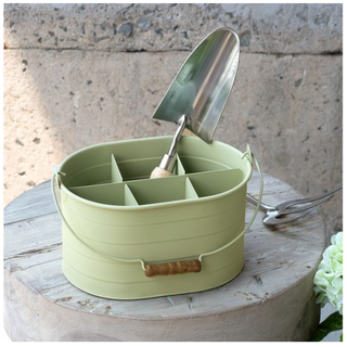 Lt. green round garden caddy with six compartments and trowel included