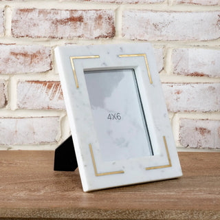 Marble frame with brass inlay in gray stone, gold rectangular corner accents, 4x6.