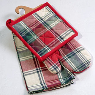 Three red-and-green plaid potholders with red edging