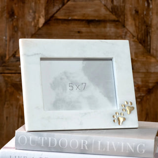 Marble paw-print photo frame in pale gray with gold paw print accents, fits a 5x7 photo
