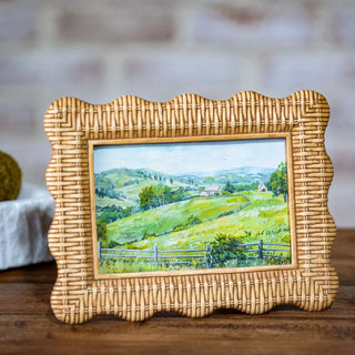 Natural Weave Landscape Art in a woven wicker frame showcasing a green countryside landscape.