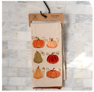 Autumn pumpkin dish towel, beige linen with orange, brown, and red pumpkin embroidery.