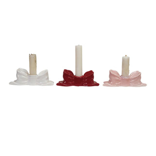 Stoneware bow-shaped taper candle holders, set of 3 in white, red and pink