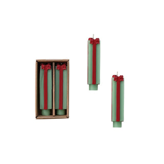 Taper candles, unscented, set of four in green with red ribbon bows, boxed