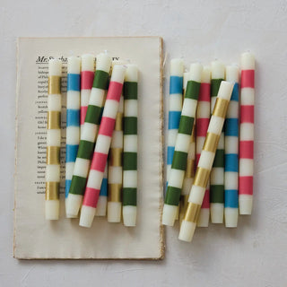 Candles - unscented striped taper candles in cream with blue, pink, green and gold stripes; several in a box