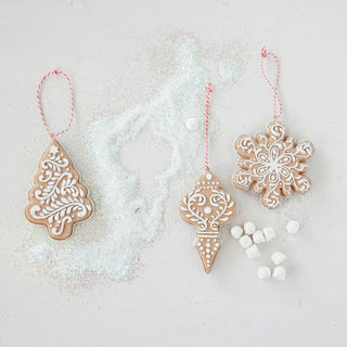 Resin gingerbread cookie ornaments, brown with white icing, 3-piece set on red-and-white twine