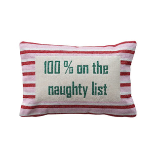 Cotton embroidered lumbar pillow with pink and red stripes; beige patch reads 100% on the naughty list.