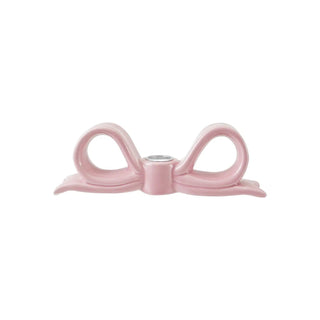 Pink ceramic bow-shaped taper candle holder with a dual-loop design