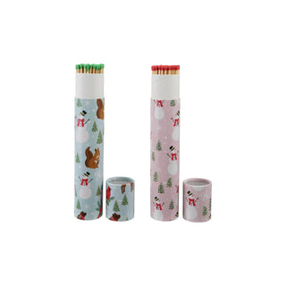 Safety fireplace matches in two holiday-patterned tubes with caps; blue snowman scene and pink tree scene with green and red tips.
