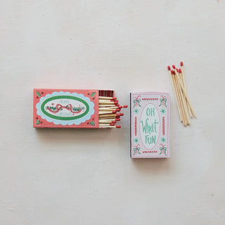 Safety matches in embossed pink holiday matchbox with Merry Christmas design and decorative holiday card