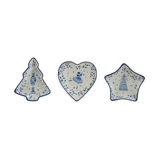 Ceramic holiday serveware trio: blue-on-white tree, heart, and star dishes with nutcracker, ballerina, tree motifs.