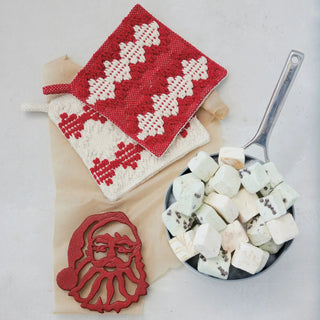 Cast iron Santa head trivet, red finish; festive holiday kitchen accessory