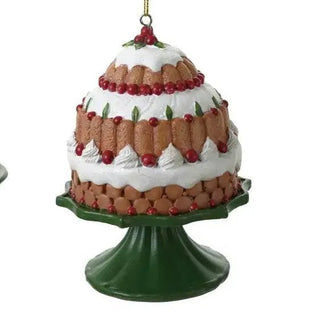 Resin cake on pedestal ornament; set of 2 holiday cakes on green stands with white icing and red berry decorations