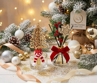 Reed diffusers 2-pack in glass bottles with festive toppers and a red bow, peppermint twist Christmas Tree scent, 6.9oz