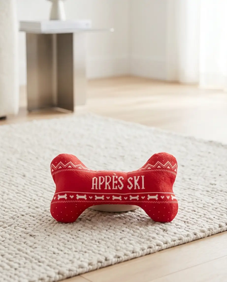 Apres Ski bone-shaped dog toy, red knit with white ski-patterns and squeaker