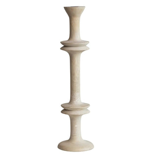 Carved mango wood taper holder in natural beige with layered disc detailing.