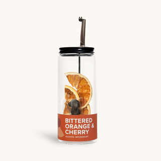 Bittered Orange & Cherry Cocktail Infusion Kit in a clear glass bottle with black lid and orange label.
