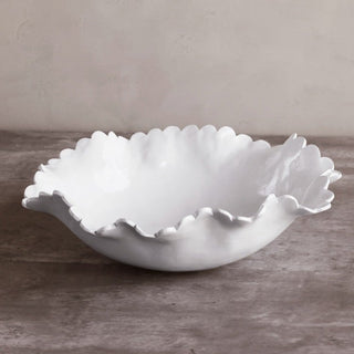 Large white Colette bowl with a scalloped, ruffled edge