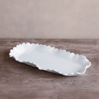 Colette large white platter with scalloped edge and smooth finish.