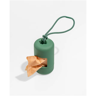 Poop bag carrier dispenser green plastic cylindrical with cord strap and protruding bag