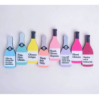 Scrubbly Sponge Tipsy bottle-shaped sponges in pastel colors lined up.