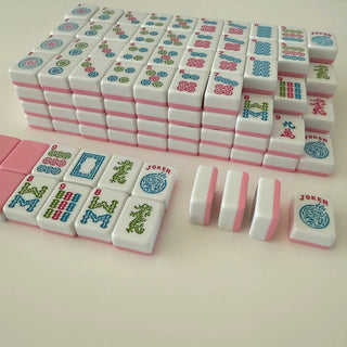 Rose Dragon American Mahjong tile set, 166 white tiles with pink backs and multicolored dragon motifs