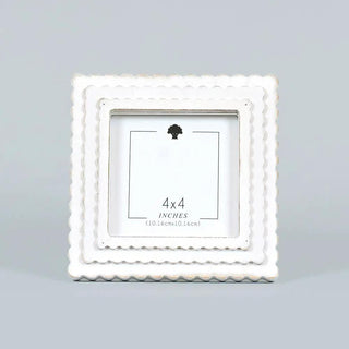 White wood scallop photo frame for 4x4 inch photos.