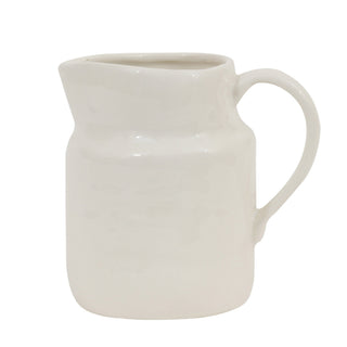 Stoneware vintage reproduction pitcher, white ceramic with a broad spout and curved handle.