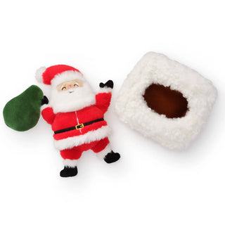 Here Comes Santa Interactive Snuffle Dog Toy; plush Santa figure in red suit with white fur trim beside a fluffy white stocking