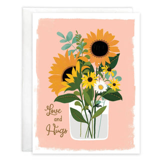 Thinking of You sunflower vase greeting card with bright yellow sunflowers on peach background