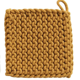 Cotton crocheted potholder in mustard color with a hanging loop, a kitchen textile for pot holders