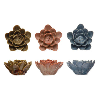 Handmade stoneware flower incense holder set in reactive glaze colors brown, red and blue (six pieces shown).