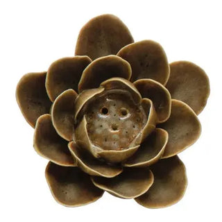 Stoneware flower incense holder with reactive glaze in earthy brown tones; handmade, color varies.