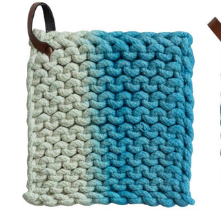 Cotton crocheted pot holder with leather loop; gradient blue to cream, chunky texture.