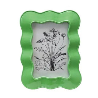 Set of four resin wavy 4x6 photo frames in pink, purple, green, and white that hang or sit.