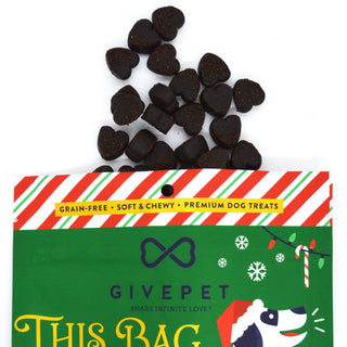 Peppermint Bark holiday dog treats, 6oz bag, dark brown heart-shaped soft chews in festive green packaging