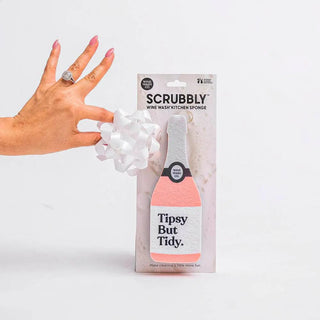 Scrubbly Sponge Tipsy, pink bottle-shaped kitchen sponge with a white label reading Tipsy But Tidy.