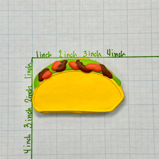 Lunch Menu Dapper cookie with bright yellow shell, green icing, and red-brown decorations
