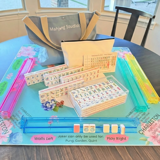 Rose Dragon American Mahjong tile set, 166 tiles, with colorful racks and a blue carrying tote.