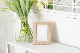Wood photo frame with scalloped edge, natural finish, for 5x7 photos.