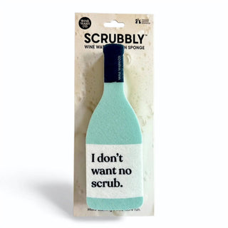 Scrubbly sponge on beige packaging with turquoise head visible