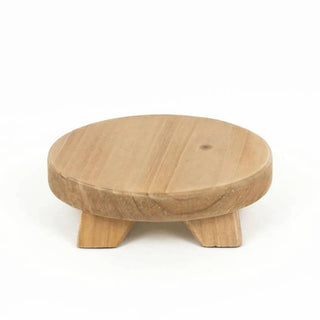 Round natural wood riser with short legs for displaying small items