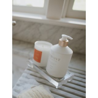 Lucite tray, medium size, clear acrylic; holds a pump bottle and a candle.