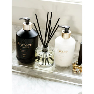 Reed Diffuser - Fresh Linen; frosted white diffuser bottle with black reeds, paired with hand soap and lotion bottles